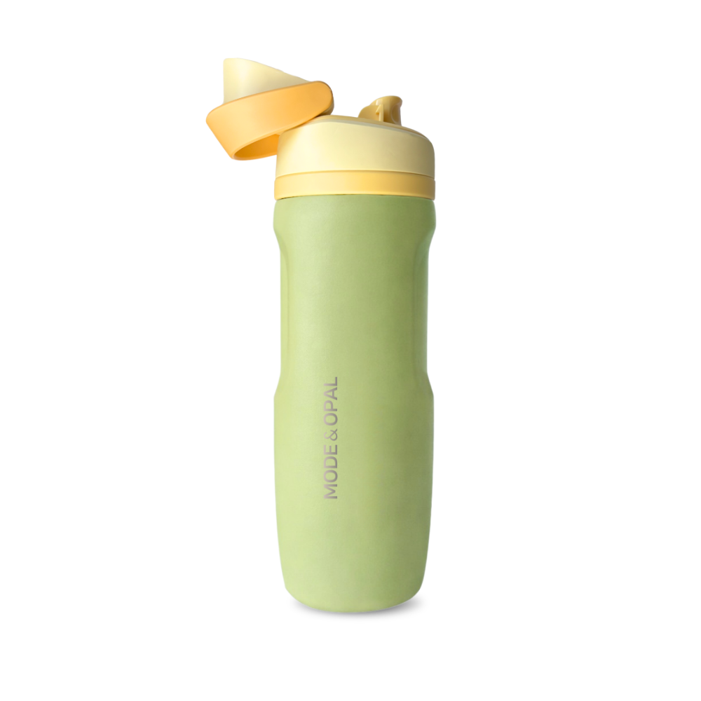 Green water bottle with a yellow cap on a white background