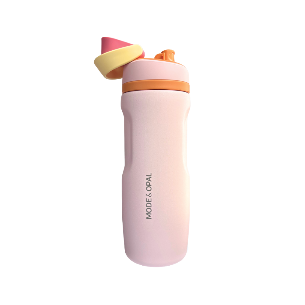 Pink water bottle with colorful cap on a white background